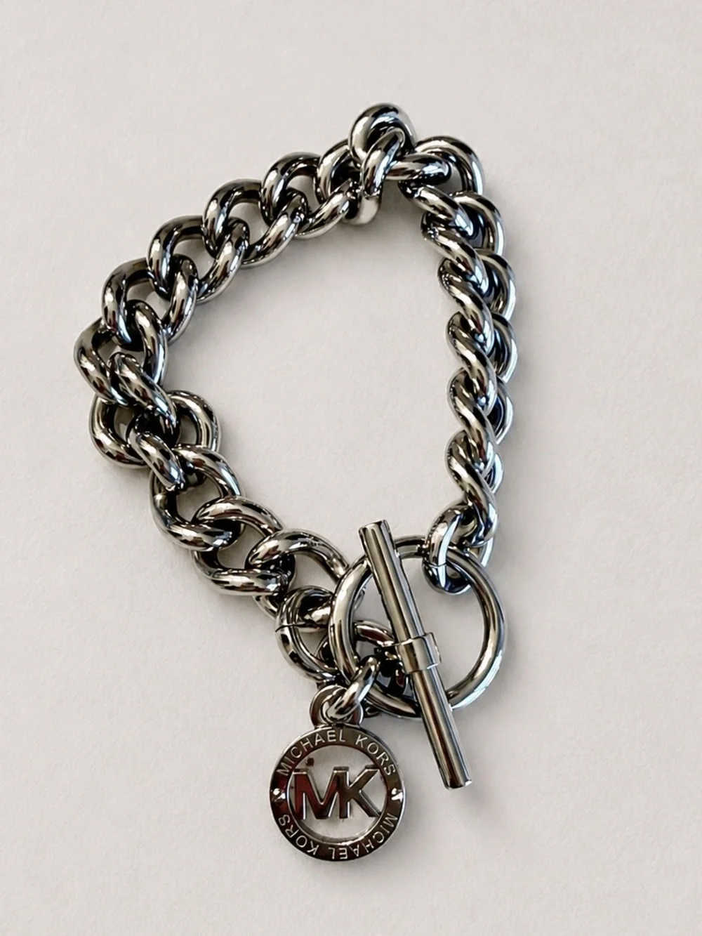 Michael Kors Silver Tone Chunky Chain Toggle MK Logo Charm Bracelet
